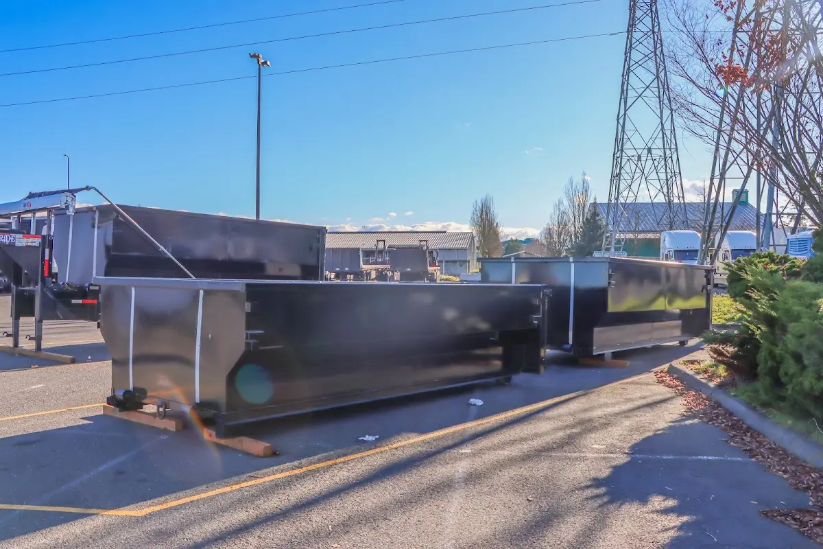 Roll-off dumpster ready for waste disposal at job site for Concrete Dumpster Rental in Lowell